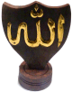 Garniture en bois comportant le nom "Allah" grave en metal dore