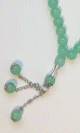 Chapelet (Subha) de luxe a 33 perles de couleur Vert clair avec parties argentees