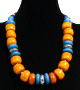 Collier ethnique artisanal pieces spheriques en tagua multicolore agencees de perles en bois