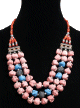 Collier ethnique artisanal trois rangs imitation pierres roses, noires, bleues, agrementees de perles et d'armatures argentees